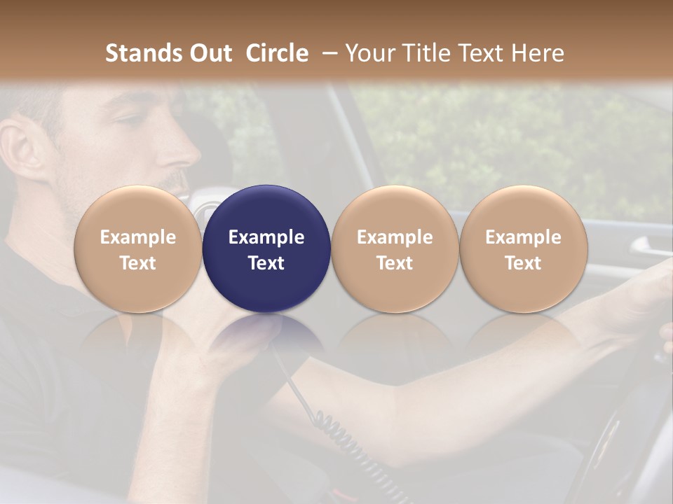A Man Sitting In A Car Holding A Camera PowerPoint Template