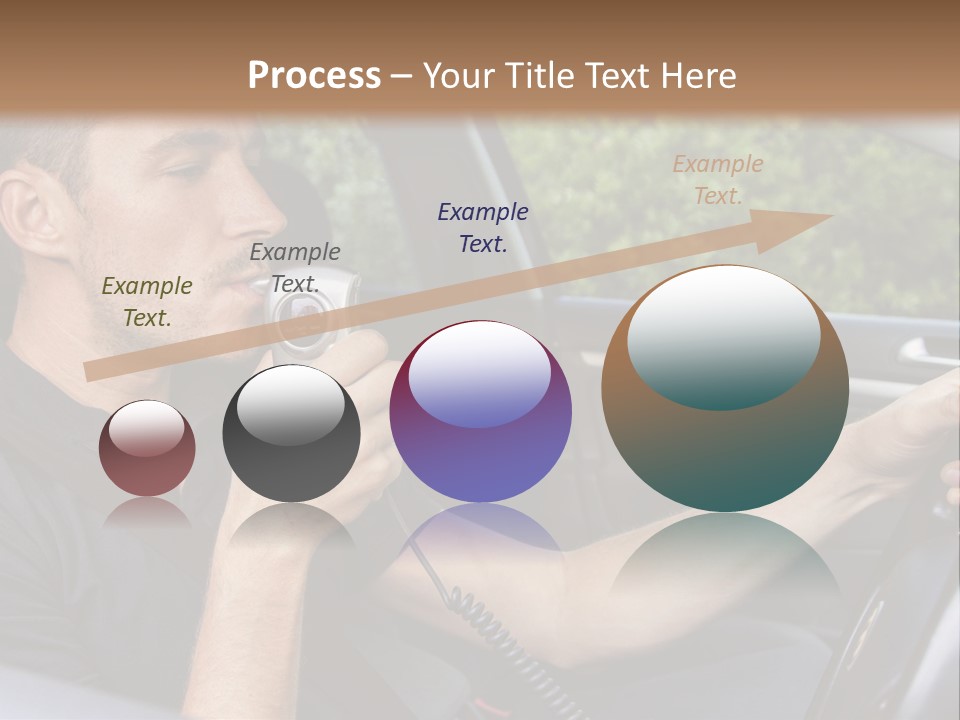 A Man Sitting In A Car Holding A Camera PowerPoint Template