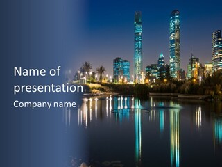 A City At Night With The Lights Of Skyscrapers Reflected In The Water PowerPoint Template
