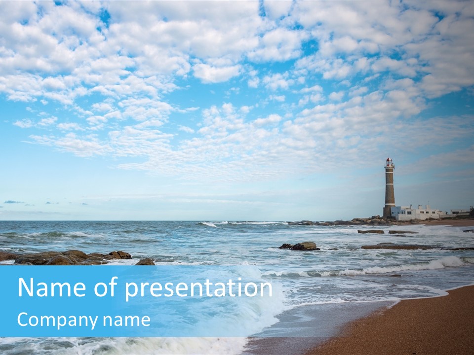 A Picture Of A Lighthouse On The Beach PowerPoint Template