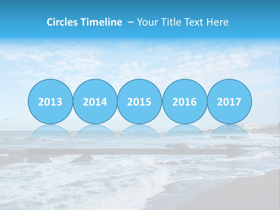 A Picture Of A Lighthouse On The Beach PowerPoint Template