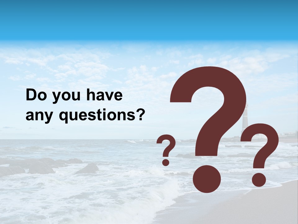 A Picture Of A Lighthouse On The Beach PowerPoint Template