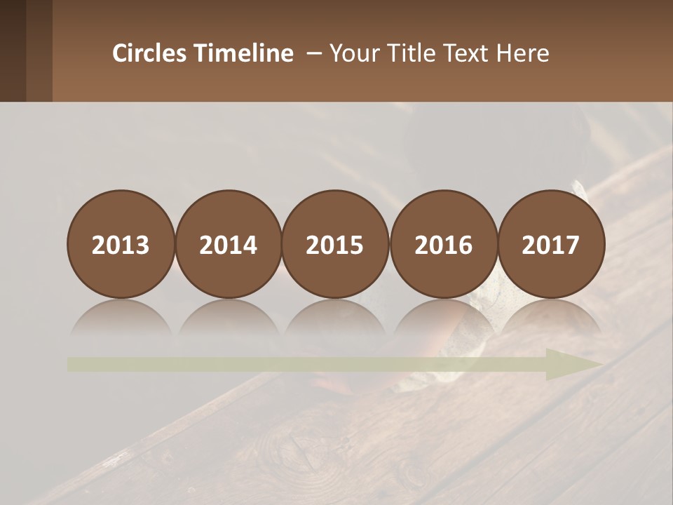 A Little Girl Sitting On A Dock Looking At The Water PowerPoint Template