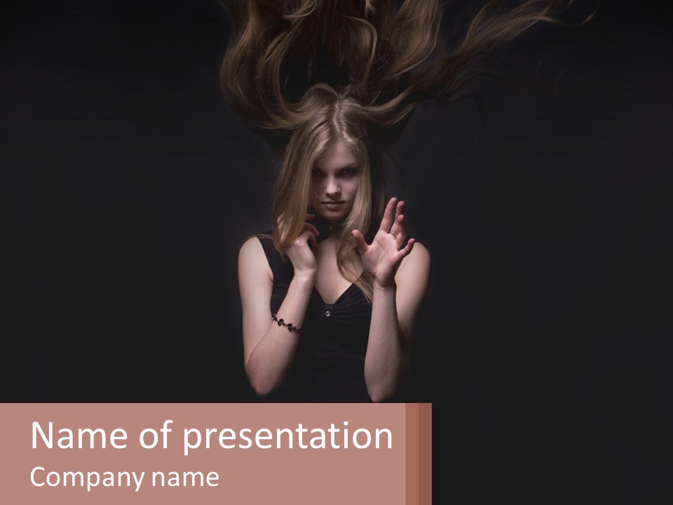 A Woman With Her Hair Blowing In The Wind PowerPoint Template