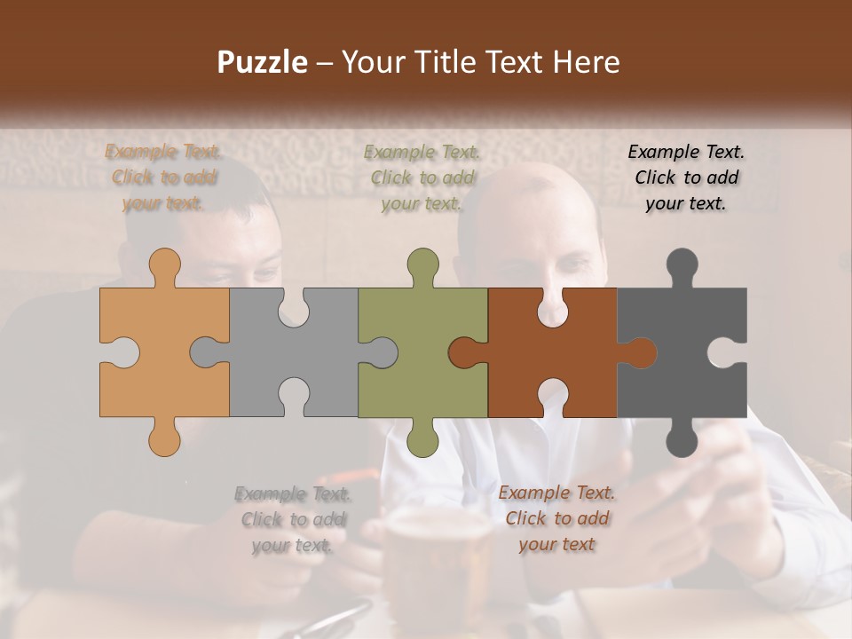 Two Men Sitting At A Table Looking At A Cell Phone PowerPoint Template