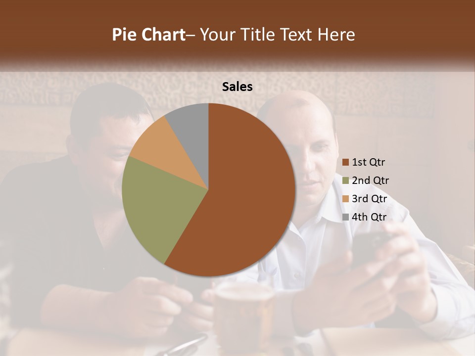 Two Men Sitting At A Table Looking At A Cell Phone PowerPoint Template