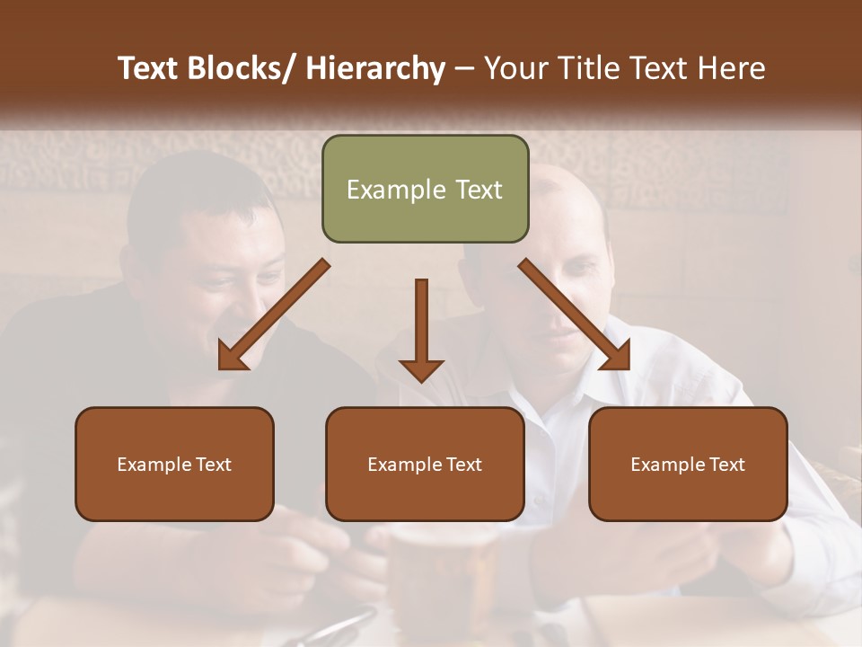 Two Men Sitting At A Table Looking At A Cell Phone PowerPoint Template