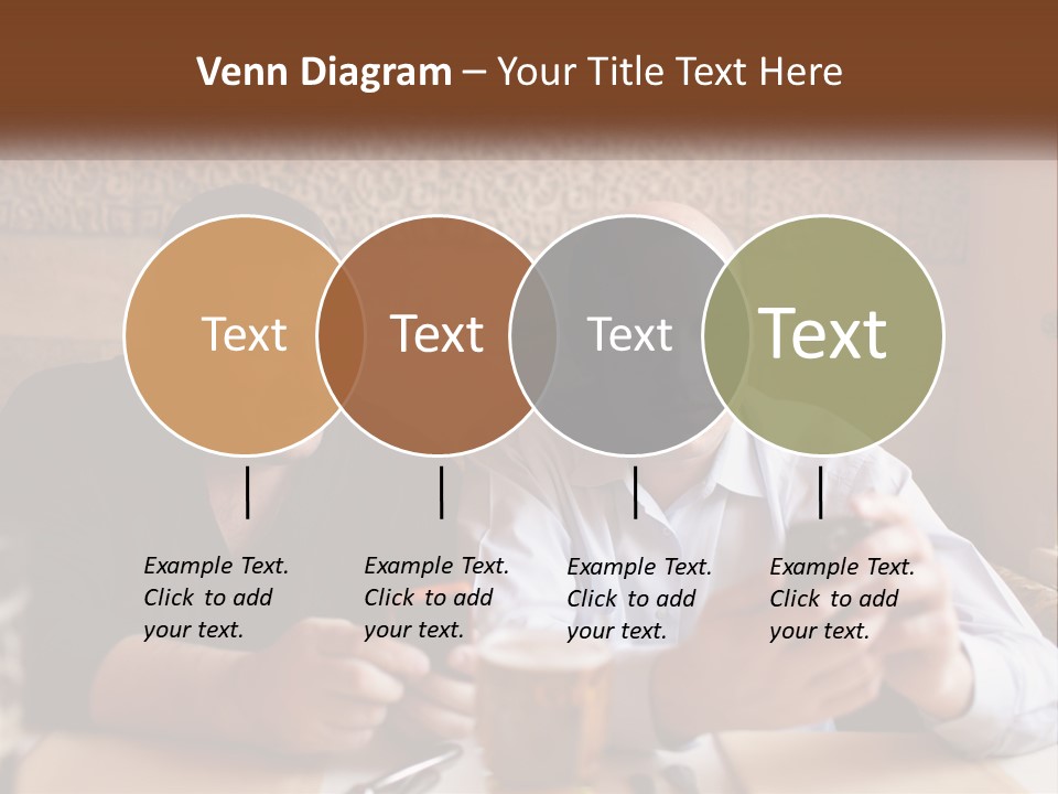Two Men Sitting At A Table Looking At A Cell Phone PowerPoint Template