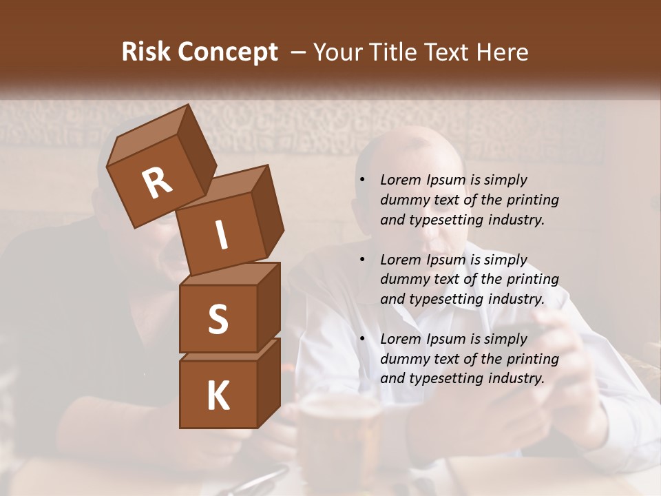 Two Men Sitting At A Table Looking At A Cell Phone PowerPoint Template