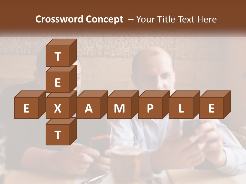Two Men Sitting At A Table Looking At A Cell Phone PowerPoint Template