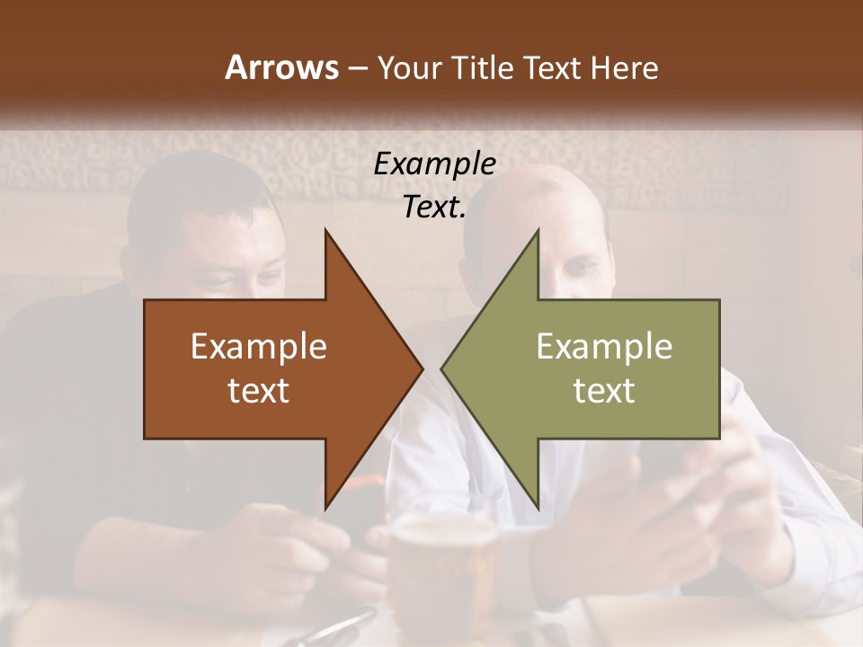 Two Men Sitting At A Table Looking At A Cell Phone PowerPoint Template