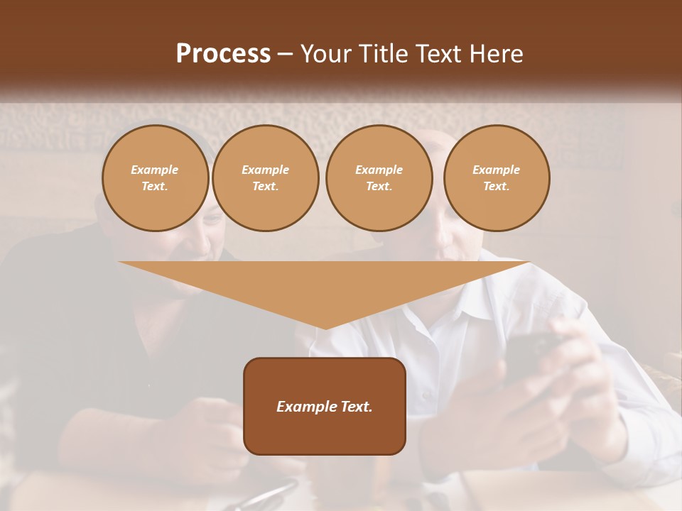 Two Men Sitting At A Table Looking At A Cell Phone PowerPoint Template