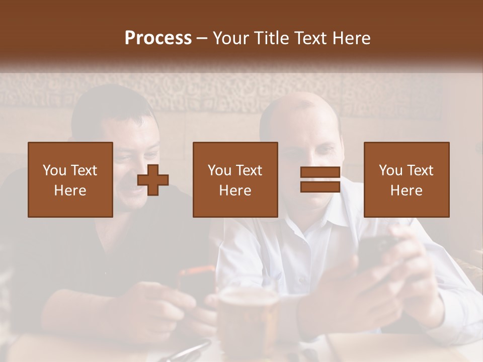 Two Men Sitting At A Table Looking At A Cell Phone PowerPoint Template