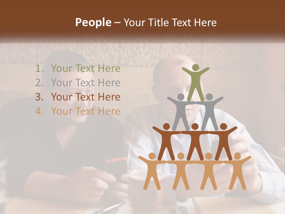 Two Men Sitting At A Table Looking At A Cell Phone PowerPoint Template