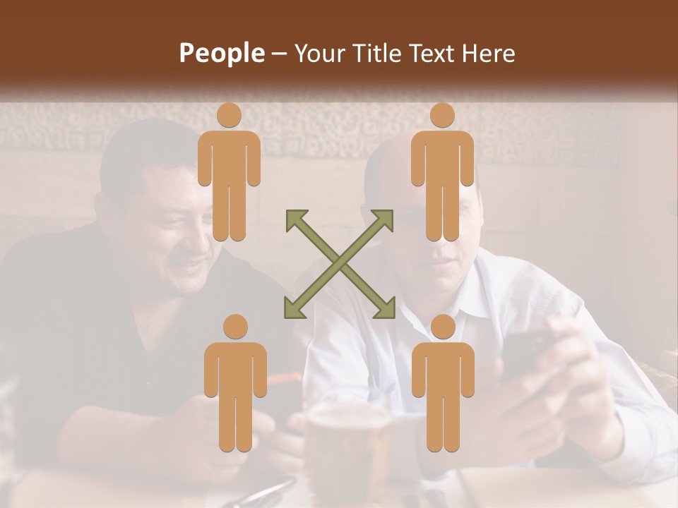 Two Men Sitting At A Table Looking At A Cell Phone PowerPoint Template