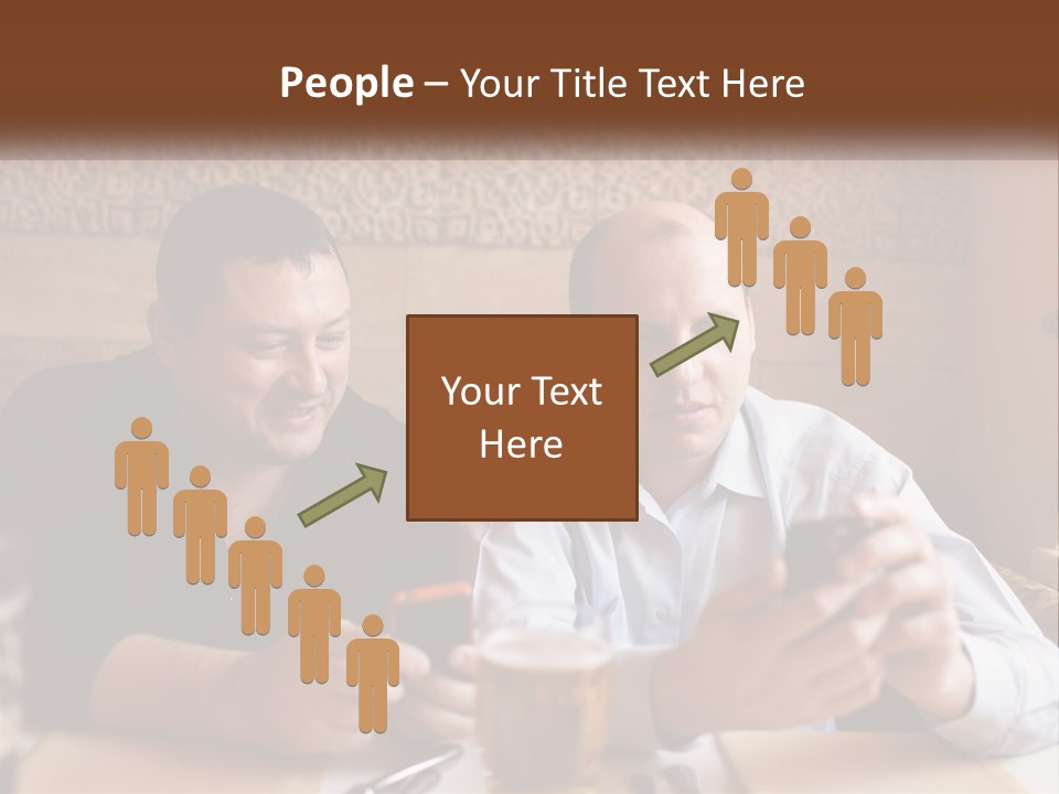 Two Men Sitting At A Table Looking At A Cell Phone PowerPoint Template