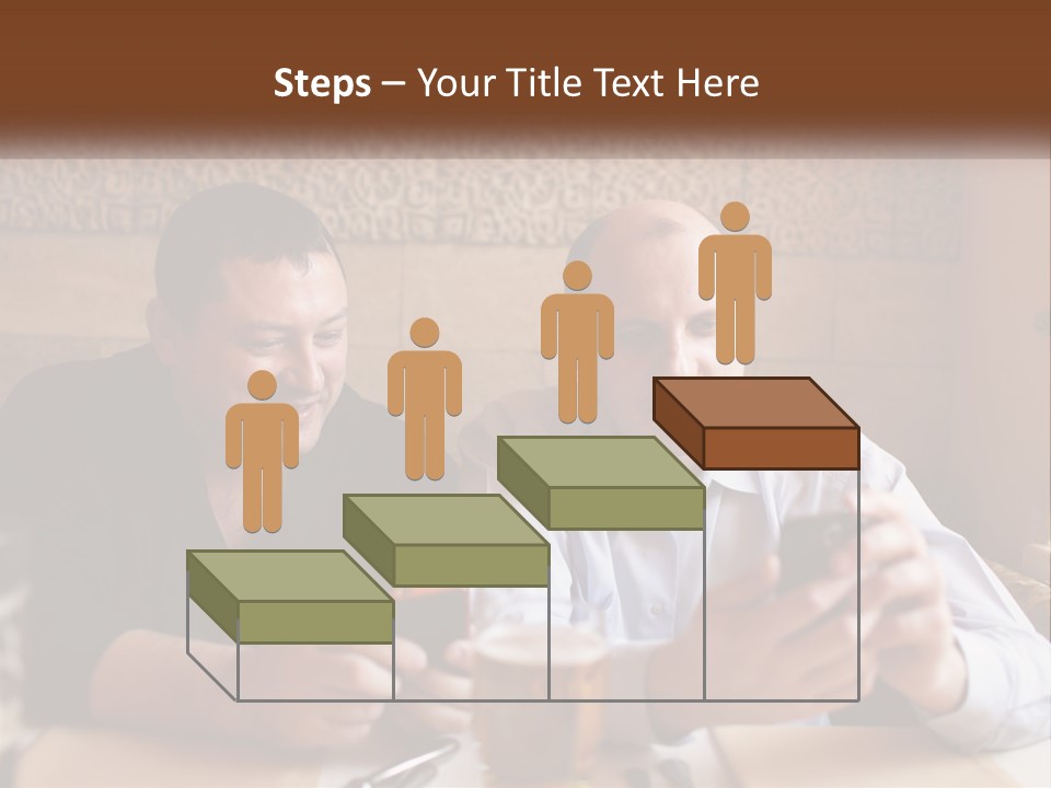 Two Men Sitting At A Table Looking At A Cell Phone PowerPoint Template