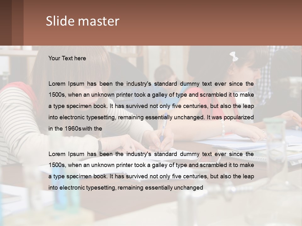 A Group Of People Sitting At A Table Writing PowerPoint Template