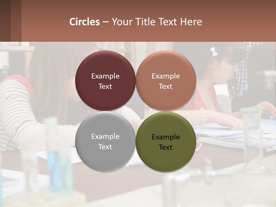 A Group Of People Sitting At A Table Writing PowerPoint Template
