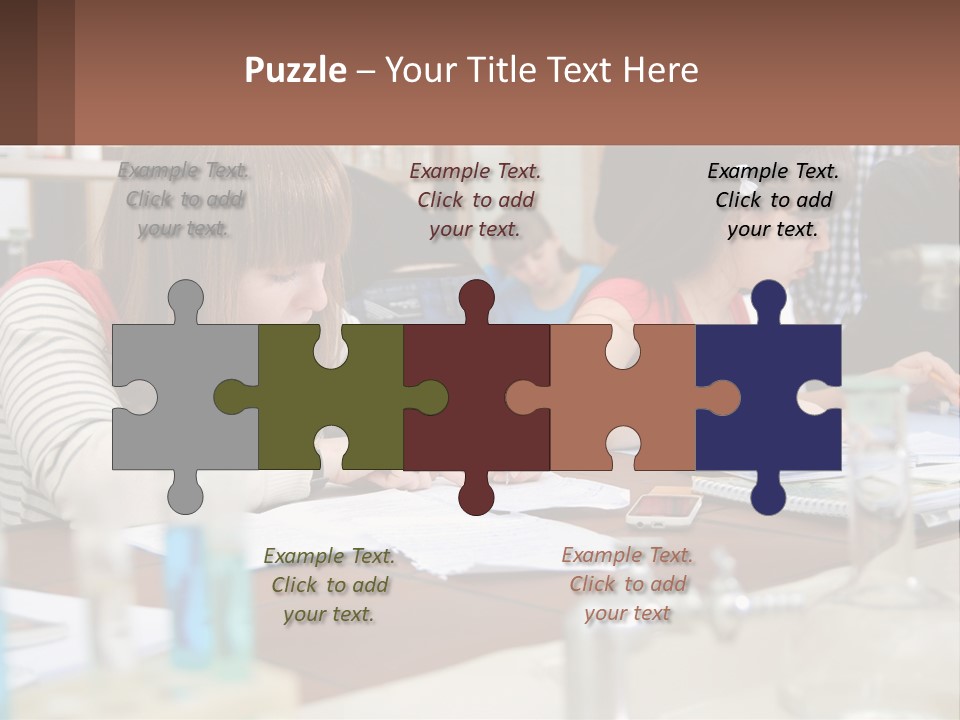 A Group Of People Sitting At A Table Writing PowerPoint Template