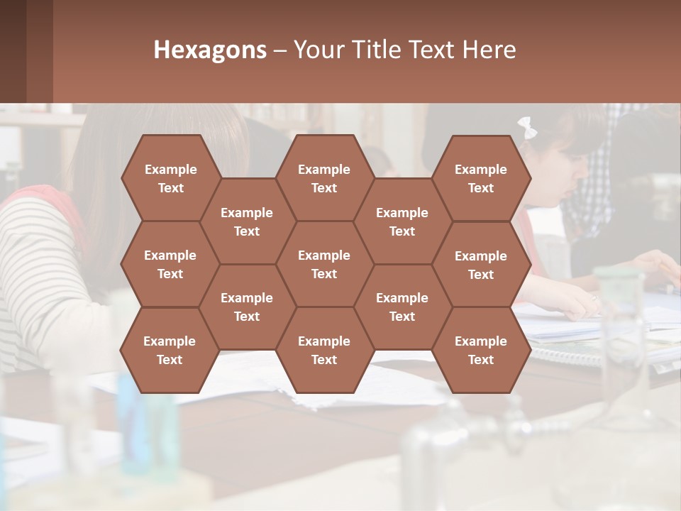 A Group Of People Sitting At A Table Writing PowerPoint Template