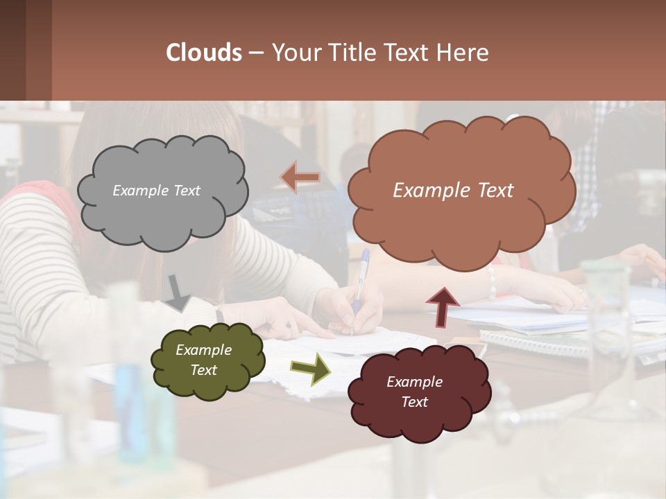 A Group Of People Sitting At A Table Writing PowerPoint Template