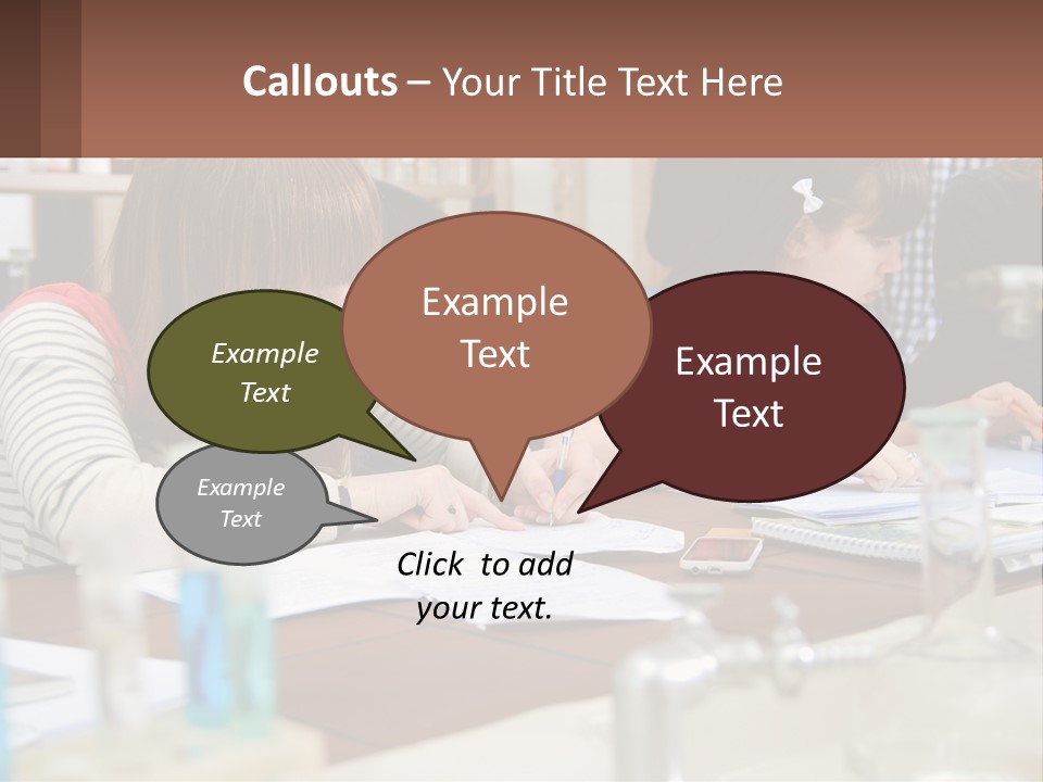 A Group Of People Sitting At A Table Writing PowerPoint Template