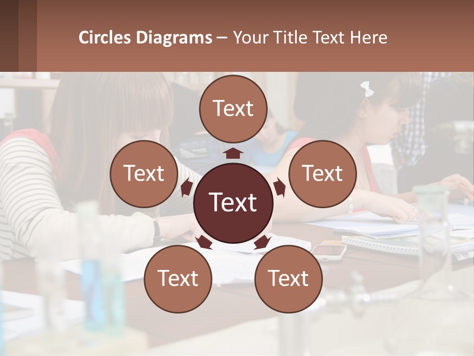 A Group Of People Sitting At A Table Writing PowerPoint Template