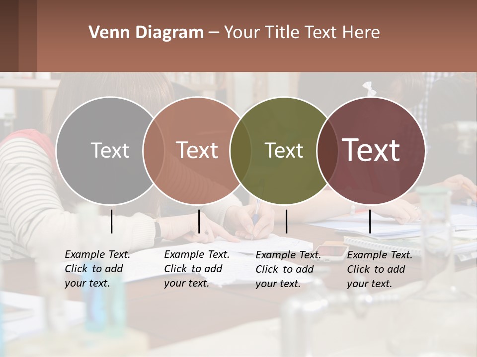 A Group Of People Sitting At A Table Writing PowerPoint Template