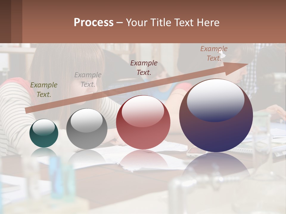 A Group Of People Sitting At A Table Writing PowerPoint Template