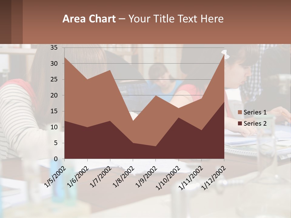 A Group Of People Sitting At A Table Writing PowerPoint Template