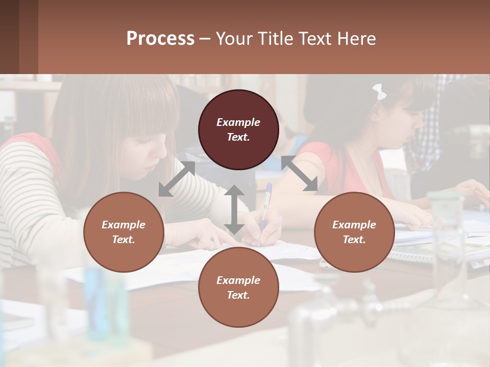 A Group Of People Sitting At A Table Writing PowerPoint Template