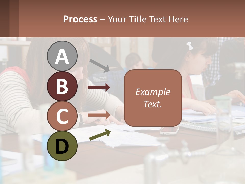 A Group Of People Sitting At A Table Writing PowerPoint Template