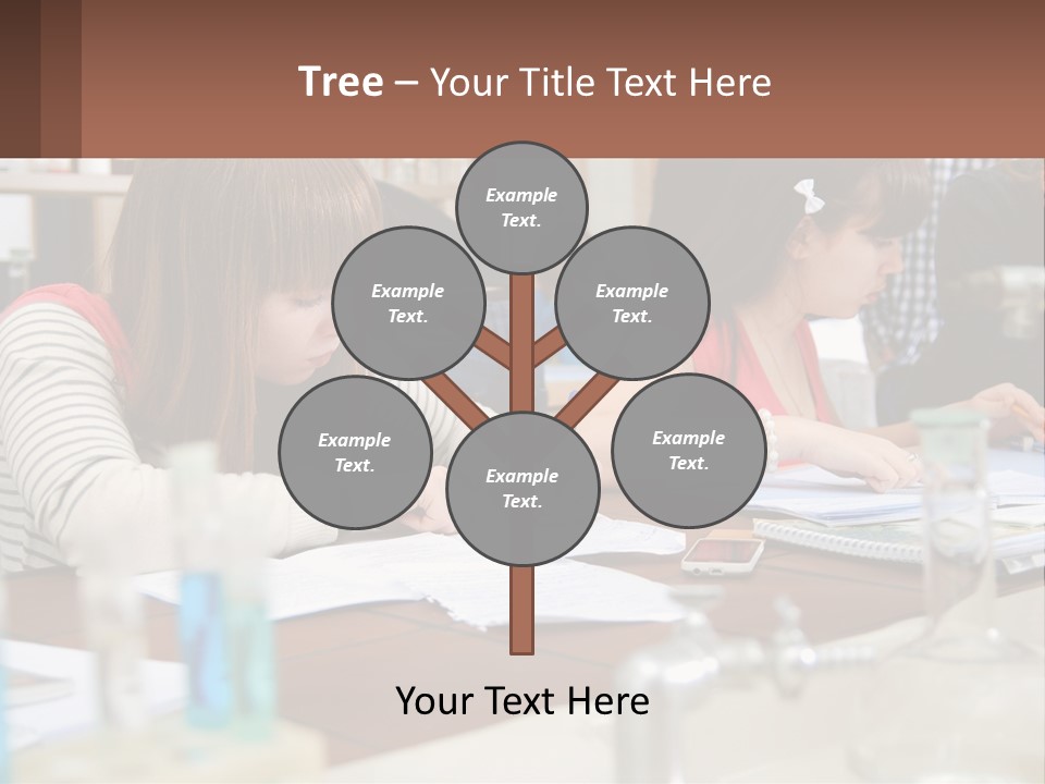 A Group Of People Sitting At A Table Writing PowerPoint Template