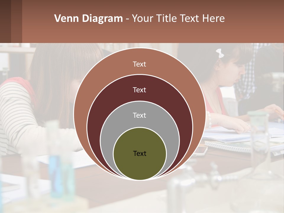 A Group Of People Sitting At A Table Writing PowerPoint Template
