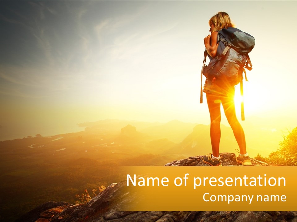 A Woman Standing On Top Of A Mountain With A Backpack PowerPoint Template