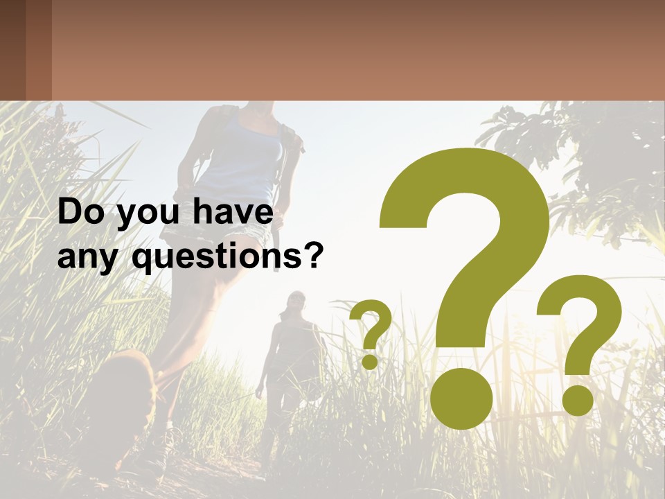A Couple Of People Walking Through A Lush Green Field PowerPoint Template