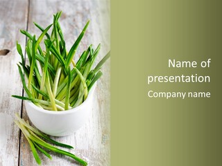 A White Bowl Filled With Green Plants On Top Of A Wooden Table PowerPoint Template