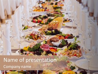 A Long Table With Many Plates Of Food On It PowerPoint Template