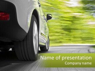 A Car Driving Down A Road With Blurry Trees In The Background PowerPoint Template