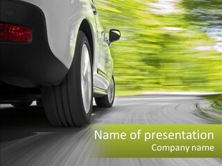 A Car Driving Down A Road With Blurry Trees In The Background PowerPoint Template
