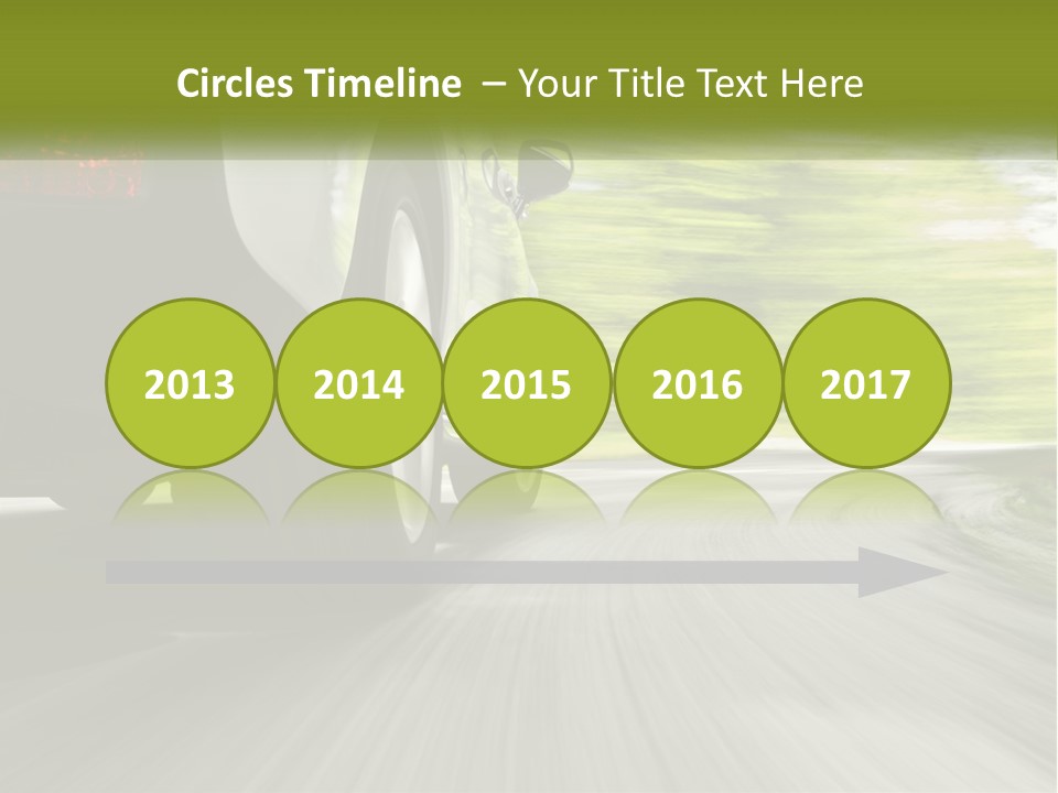 A Car Driving Down A Road With Blurry Trees In The Background PowerPoint Template