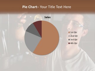 A Man Holding A Bottle Of Oil In His Hand PowerPoint Template