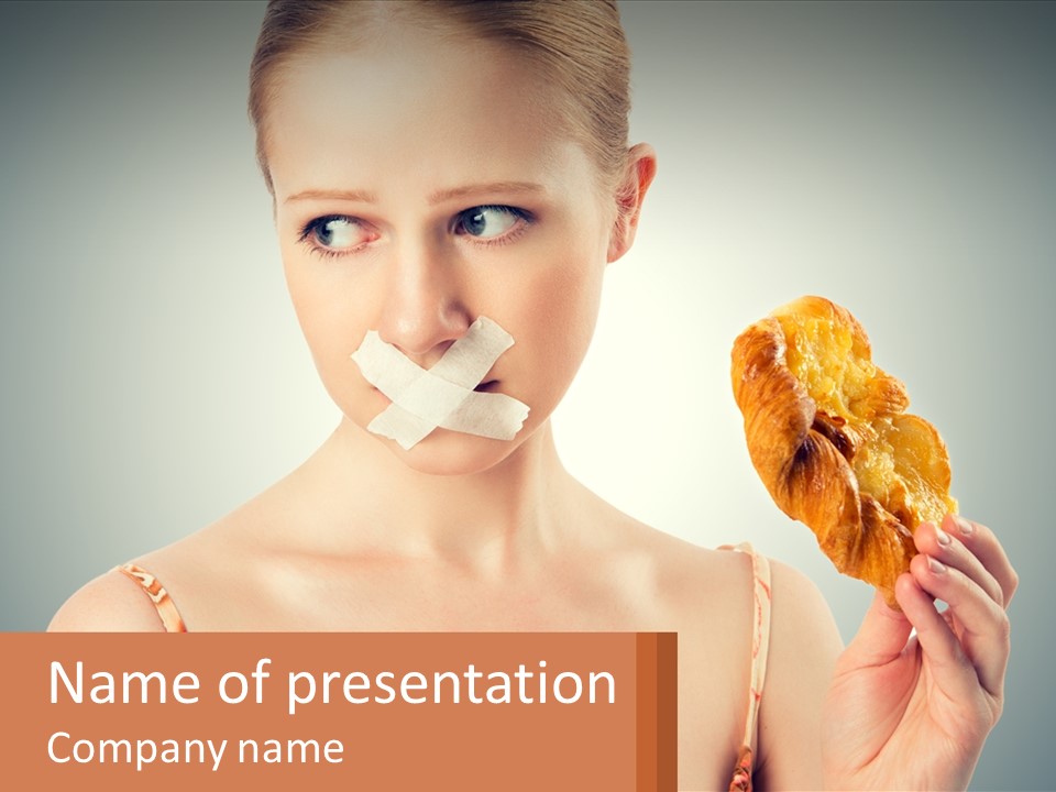 A Woman Holding A Piece Of Food In Her Hand PowerPoint Template
