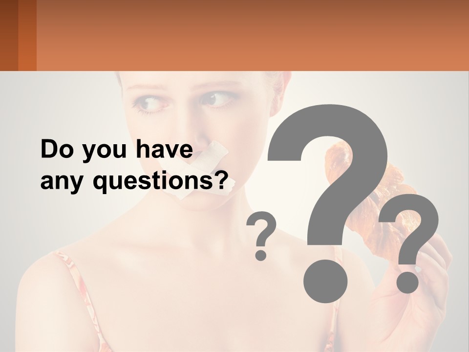 A Woman Holding A Piece Of Food In Her Hand PowerPoint Template