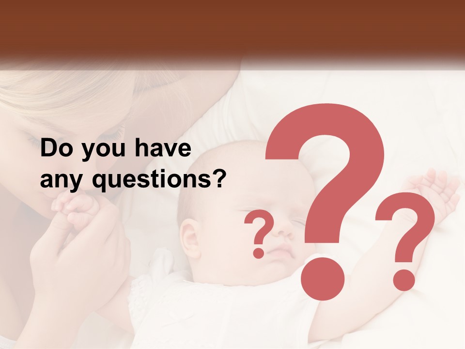 A Woman And A Baby Laying On A Bed PowerPoint Template