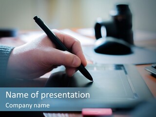 A Person Writing On A Piece Of Paper With A Pen PowerPoint Template
