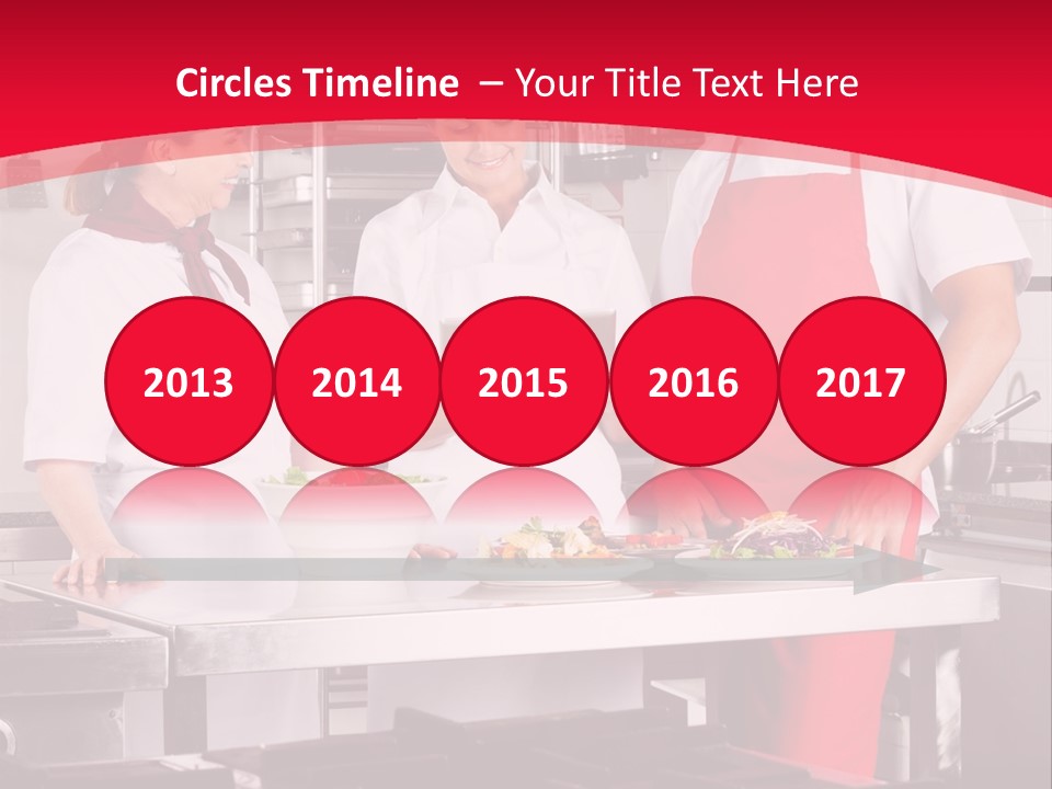 A Group Of People In A Kitchen Preparing Food PowerPoint Template