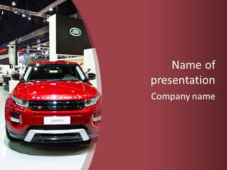 A Red Car Is On Display At A Show PowerPoint Template