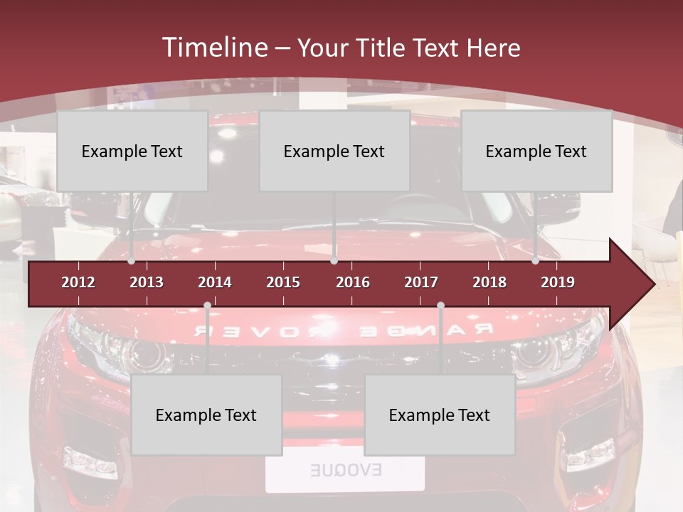 A Red Car Is On Display At A Show PowerPoint Template
